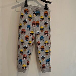 Stella McCartney Kids Gray Joggers with Vibrant Helmet Design